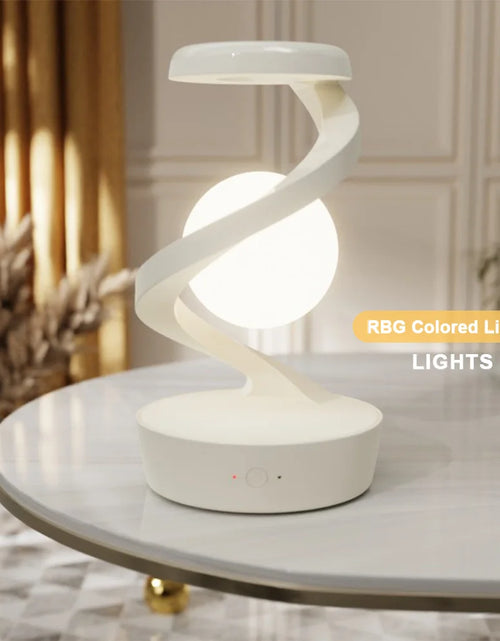 Load image into Gallery viewer, 3D Levitating Ball Lamp with Wireless Phone Charger Creative Table 3D LED Lamp Floating Moon Table Lamp for Bedroom Novelty Gift
